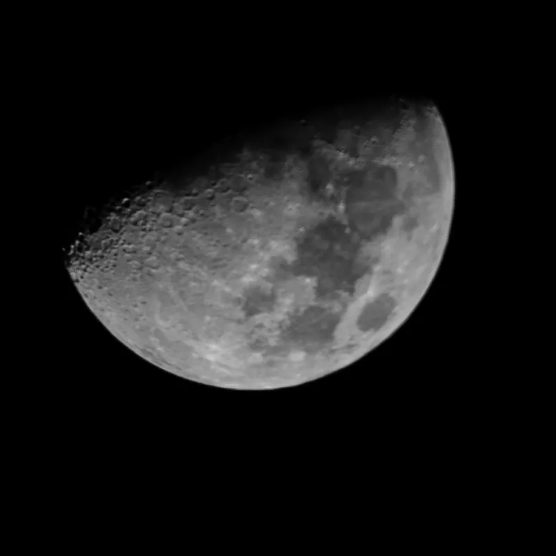 First quarter Moon photographed through a DSLR